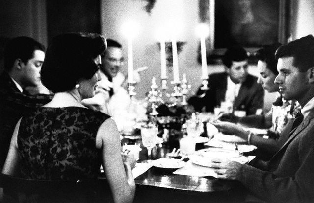 Jacqueline and Robert Kennedy at a dinner party hosted by the Kennedys in Georgetown, June 3, 1957.
