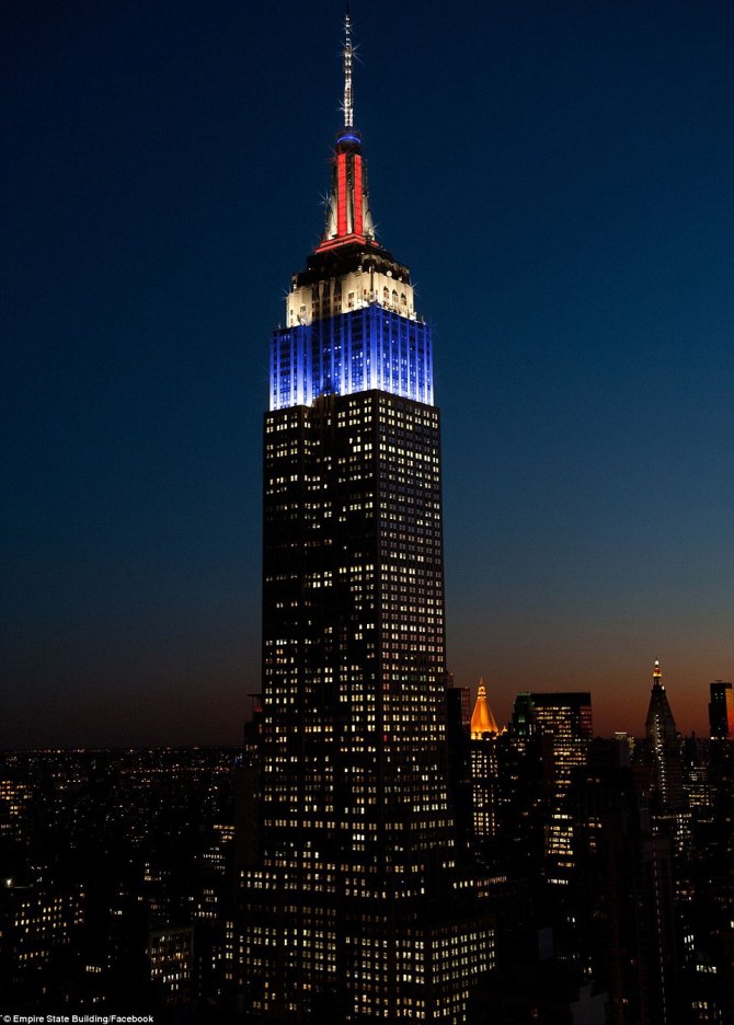 23DD251400000578-2866141-Imperial_welcome_The_Empire_State_Building_was_lit_red_white_and-a-43_1418080544387