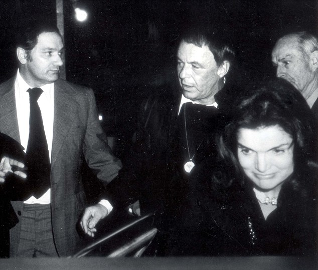 PKT4594-341110 JACQUELINE KENNEDY ONASSIS 1974 Jacqueline Kennedy Onassis and Frank Sinatra leaving Jilly's in New York after Jackie had attended Sinatra's 'COME BACK' concert in Providence R. I. They flew together to Providence and back in his rpivate jet.