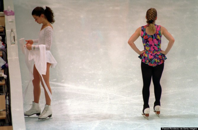 17 FEB 1994: NANCY KERRIGAN AND TONYA HARDING OF THE UNITED STATES PASS EACH OTHER WITHOUT NOTICE DURING A PRACTICE SESSI0N AT THE 1994 LILLEHAMMER WINTER OLYMPICS. Mandatory Credit: Pascal Rondeau/ALLSPORT